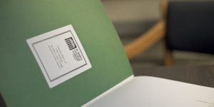 Gift plate on library book