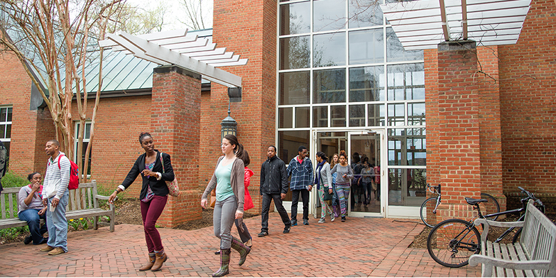 students leaving library