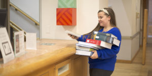 Student returning library books