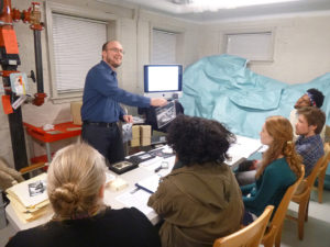 Kent teaching a class in the archives