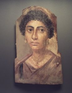 painting of a woman with dark hair and earrings