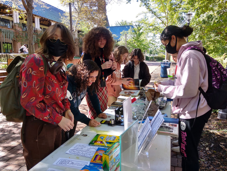Students making buttons!